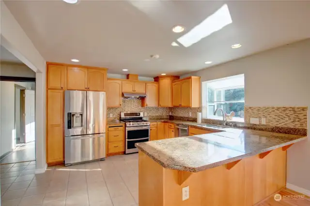 Kitchen with loads of cabinets & counter space.