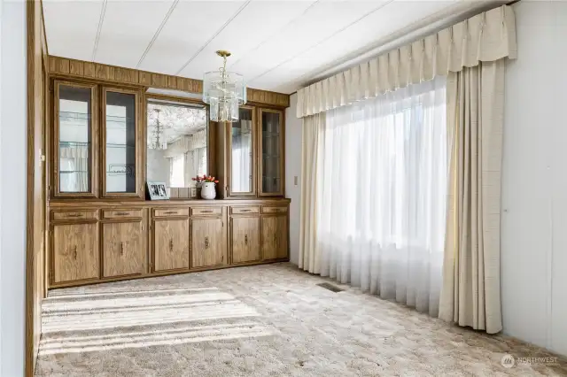 Dining room has built in China cabinet with room to store all your special things