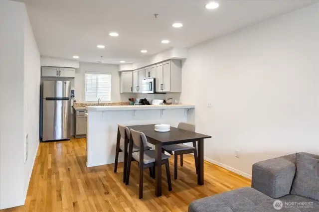 A look at the dining room and kitchen  from the living room.