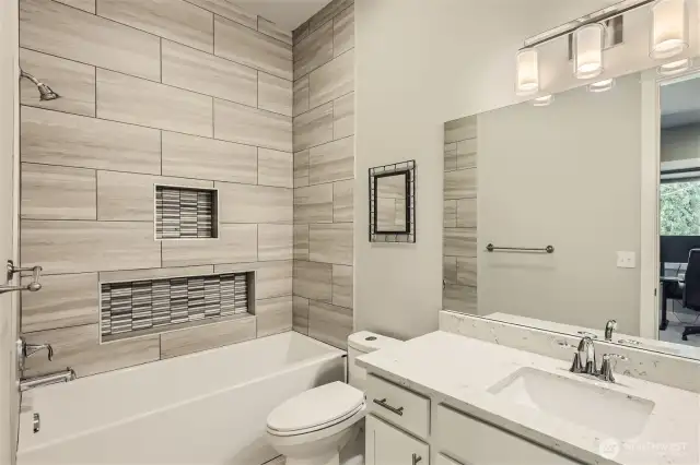 High-end full bath on main floor. Adjacent to main floor bedroom. Perfect for guests or those who can't do stairs!