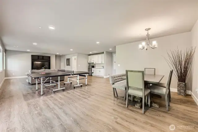1,100 Sqft mother-in-law space on lower level with 10x10 bedroom, full bath, kitchenette, huge storage closet, dining space and covered patio.