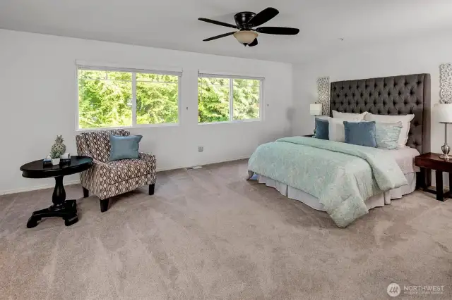 Unwind in your oversized primary suite and personal retreat featuring space for a sitting nook or home office.