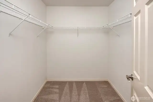 Primary suite walk-in closet.
