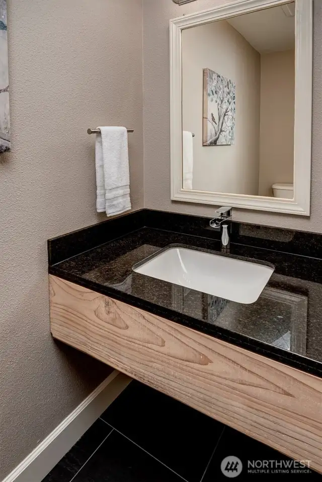 Convenient powder room on the main level.