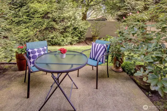 Cozy and charming patio creates the perfect setting for morning coffee or alfresco dining.
