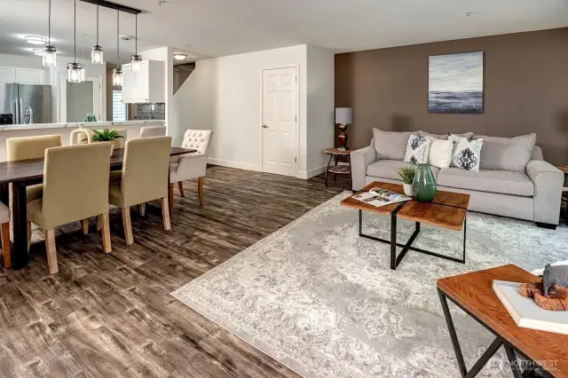 Open-concept main floor where the living, dining, and kitchen areas flow seamlessly together.
