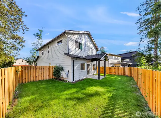 fully fenced backyard added by seller