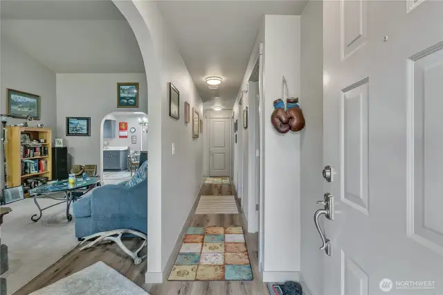 Arched doorways and vaulted ceilings add architectural interest.