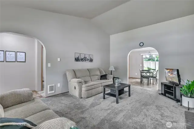 The living room flows into the dining room for easy flow gatherings.