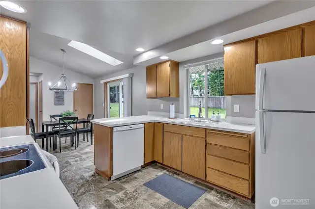 Warm and inviting kitchen open to the dining room.