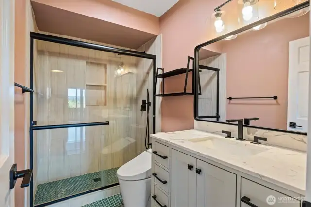 Stunningly updated full bath on the lower level.