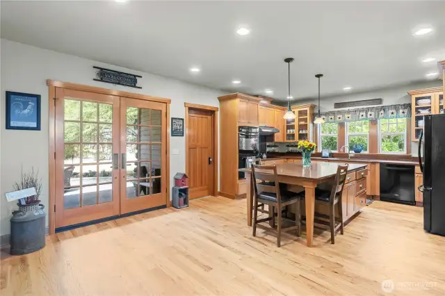 French doors lead to outside living, perfect for summertime dining