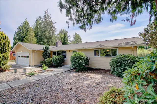 This well maintained home has great curb appeal with easy low maintenance landscaping.