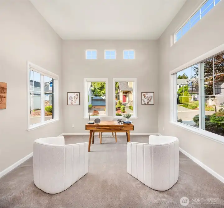 This is another finished room on the main level - perfect home office or could be enclosed for a guest bedroom.