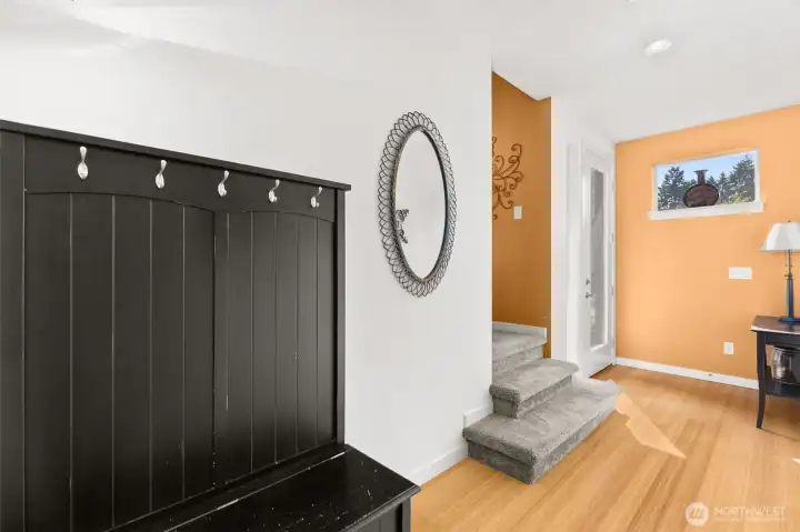 Bright entry with room for seating plus a large coat closet