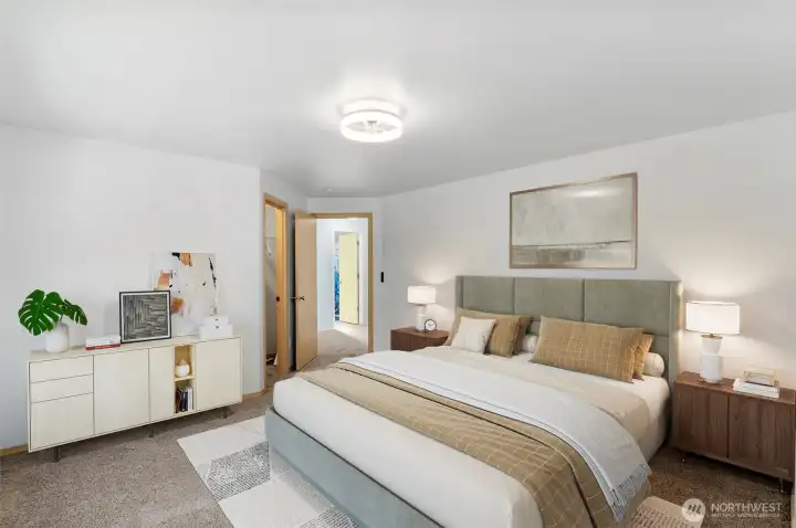 Relax in the serene primary suite with plush new carpeting, soothing paint colors, and generous closet space. Large windows bring in soft natural light, creating a calm retreat in this turn-key Mount Vernon home. (Virtually Staged)