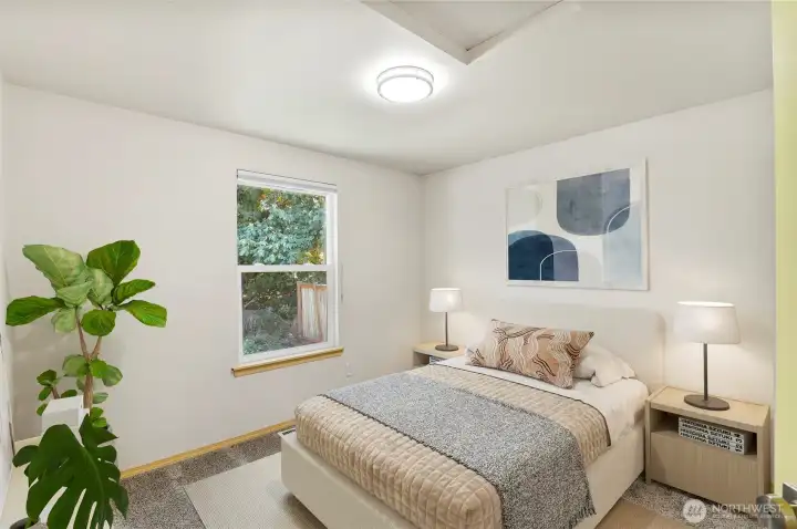 Two additional bedrooms with fresh paint and new carpeting offer flexible space for guests, a home office, or hobbies. Bright, inviting, and move-in ready. (Virtually Staged)