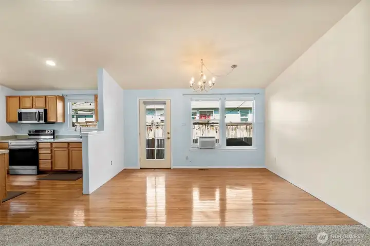 Spacious dining area open to the kitchen—great for family meals or hosting guests.