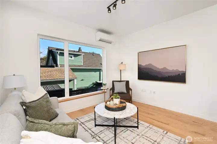 This is a really nice dining, living and kitchen space.