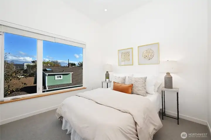 The upper 3rd floor hosts both bedrooms.