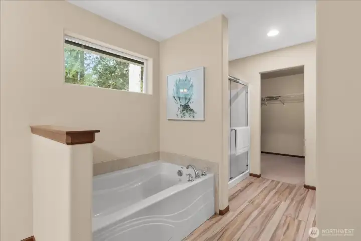 Soaking tub & separate shower.