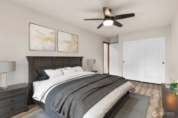 Virtually staged guest bedroom.