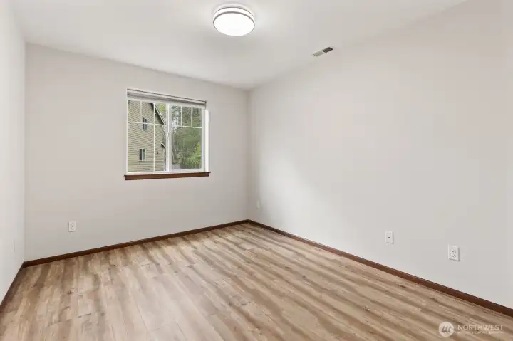 Two guest bedrooms have new lighting.