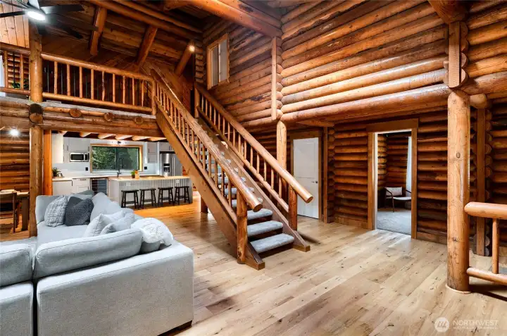 Beautiful engineered hardwood floors and vaulted ceilings.