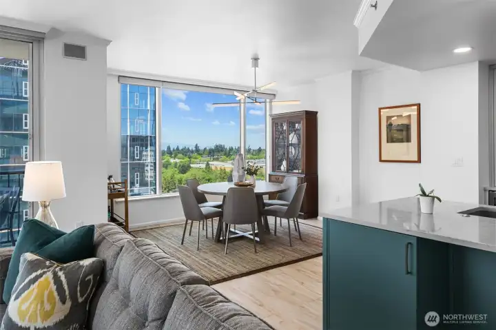 Dining area with open layout connecting kitchen and living room for easy entertaining.