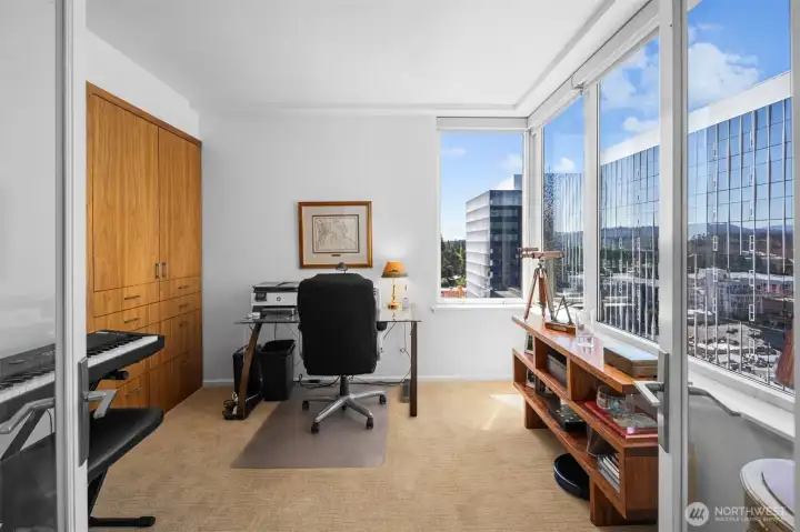 Versatile den or office that can function as a guest room or potential third bedroom.