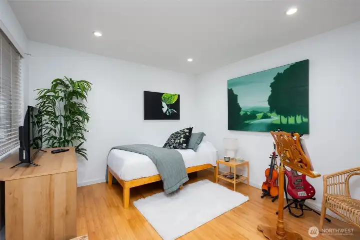 The private guest bedroom occupies its own wing and comes with a separate full bathroom for added privacy.