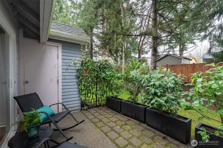 Outdoor private patio with storage.