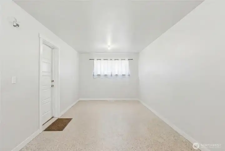 This flexible section of the garage is ideal for a home office, fitness area,  studio or workshop.