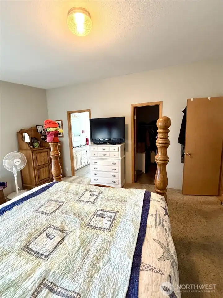 Primary Bedroom - View towards walk-in closet & bathroom