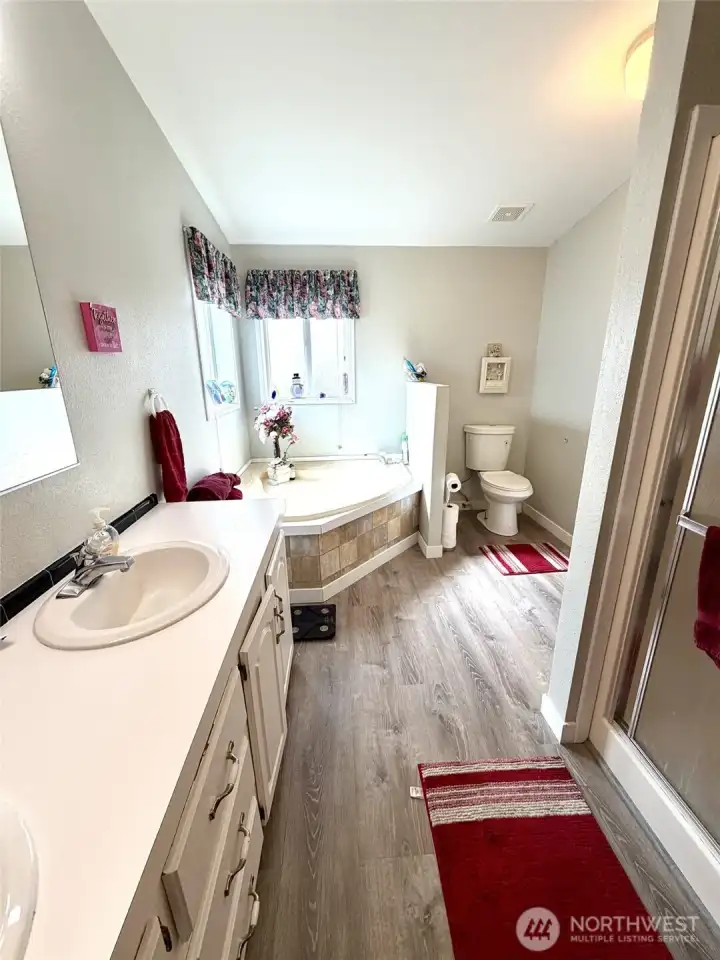 Primary Bathroom - Corner Tub & Shower