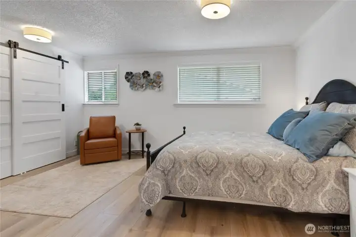 Plenty of natural light, a convenient sitting area to relax a read, and easy to maintain Luxury plank vinyl flooring!