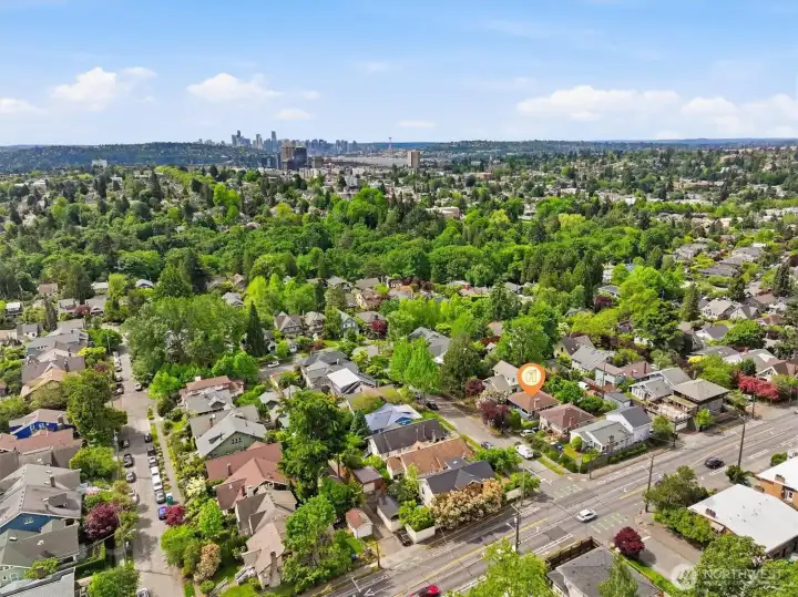 Aerial photo looking south. You can see downtown and Lake Union from photo. And you can see Ravenna Park that is only a couple of blocks away! Coveted Ravenna Park location, walking distance to light rail, Whole Foods, restaurants, Ravenna Park, cafes, etc. And only minutes to UW, Children's, downtown, Amazon & 520. A remarkable 94 walk score and 90 bike score!