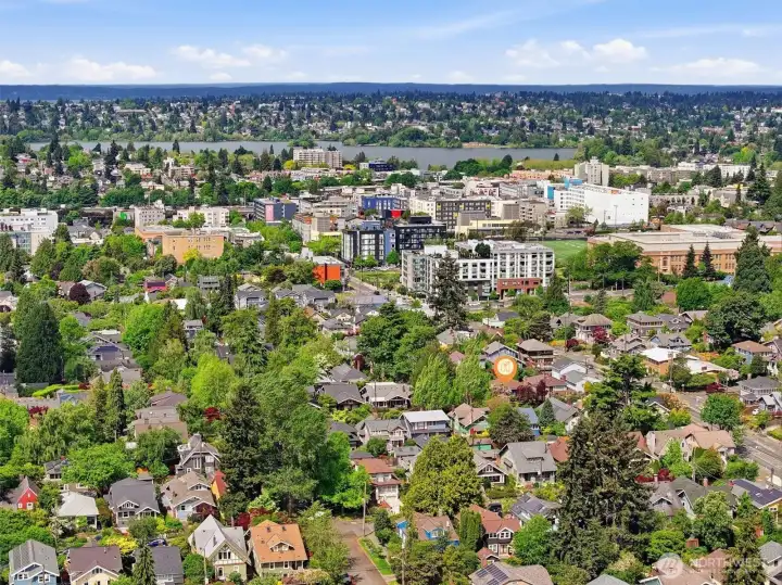 Aerial photo looking west. You can see Green Lake from this photo. Coveted Ravenna Park location, walking distance to light rail, Whole Foods, restaurants, Ravenna Park, cafes, etc. And only minutes to UW, Children's, downtown, Amazon & 520. A remarkable 94 walk score and 90 bike score!