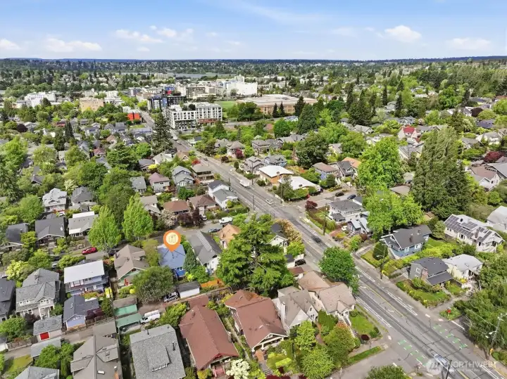 Aerial photo looking west. You can see Green Lake from this photo. Coveted Ravenna Park location, walking distance to light rail, Whole Foods, restaurants, Ravenna Park, cafes, etc. And only minutes to UW, Children's, downtown, Amazon & 520. A remarkable 94 walk score and 90 bike score!