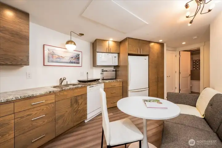 Lower-level kitchen, dining, and living area. Lower-level kitchen, dining, and living area.