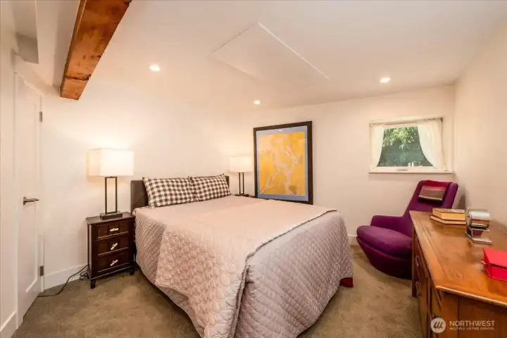 Lower-level primary bedroom. Lower-level primary bedroom.