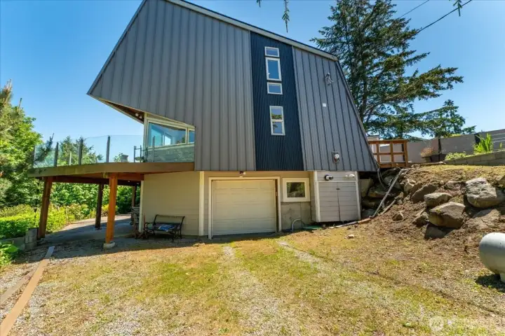 Garage and private driveway for lower-level. Garage and private driveway for lower-level.