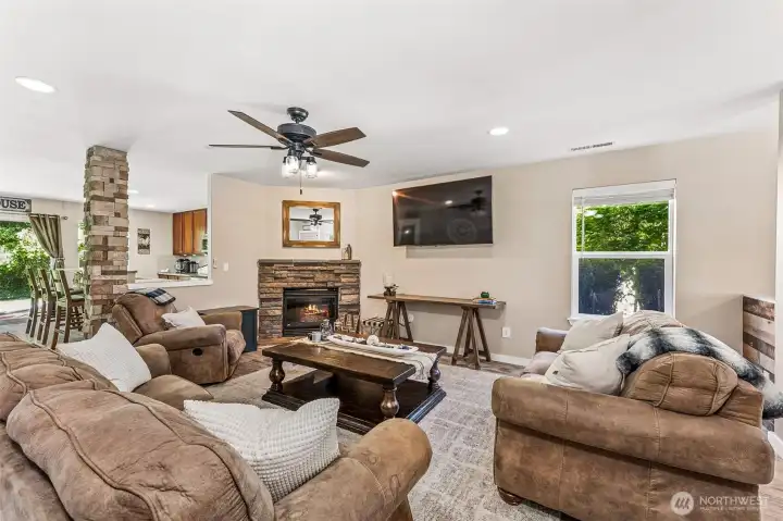 Cozy gas fireplace, ceiling fan, and 2" faux wood blinds throughout. Cozy gas fireplace, ceiling fan, and 2" faux wood blinds throughout.