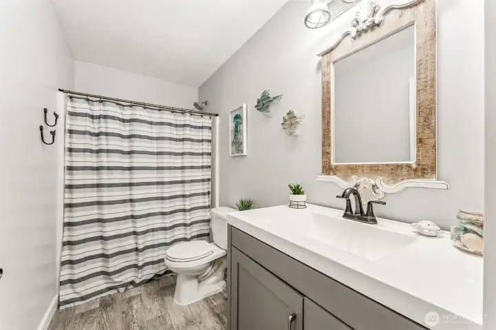 Upstairs full hall bath. Upstairs full hall bath.