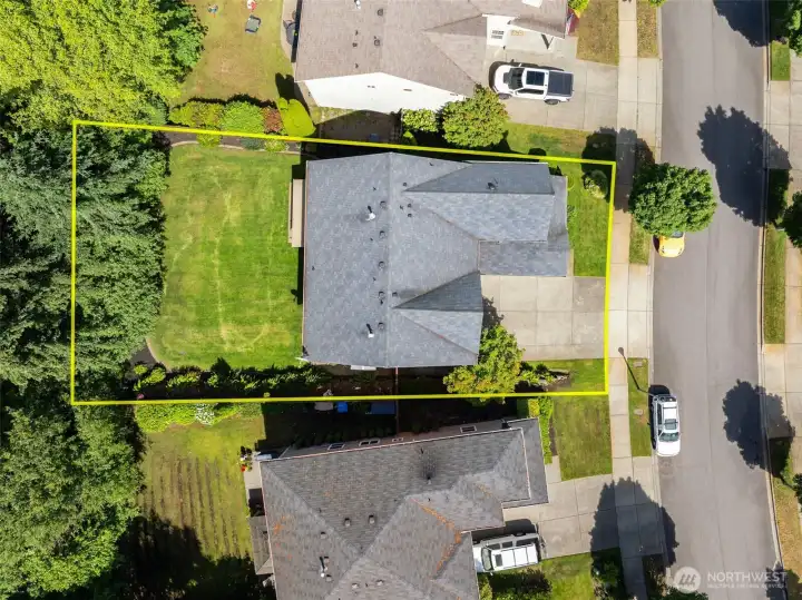 Lawn has irrigation system front and back. Lawn has irrigation system front and back.