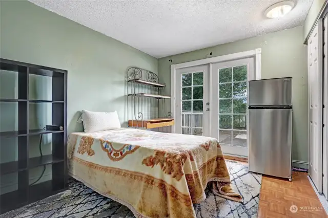 Third upstairs bedroom with deck access