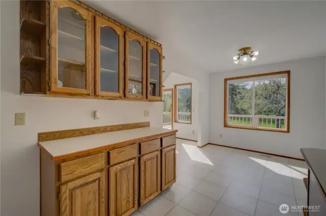 From the kitchen looking into the breakfast nook and sun room.