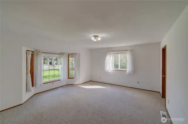 Primary suite with walk in shower and full bath.