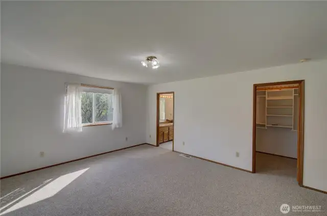 Primary suite with walk in shower and full bath.