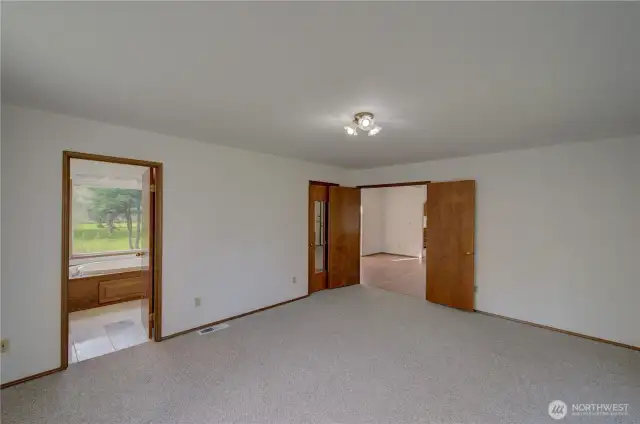 Primary suite with walk in shower and full bath.